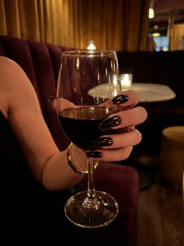 Deep cherry red nails for healthy nail growth.